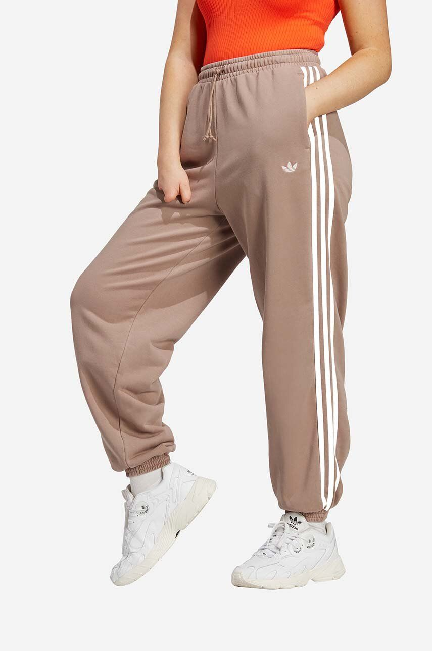 adidas Original spodnie dresowe Jogger brązowe damskie IP7139