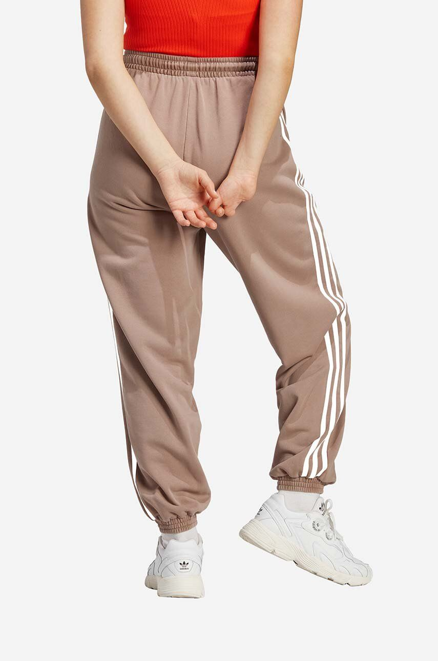 adidas Original spodnie dresowe Jogger brązowe damskie IP7139